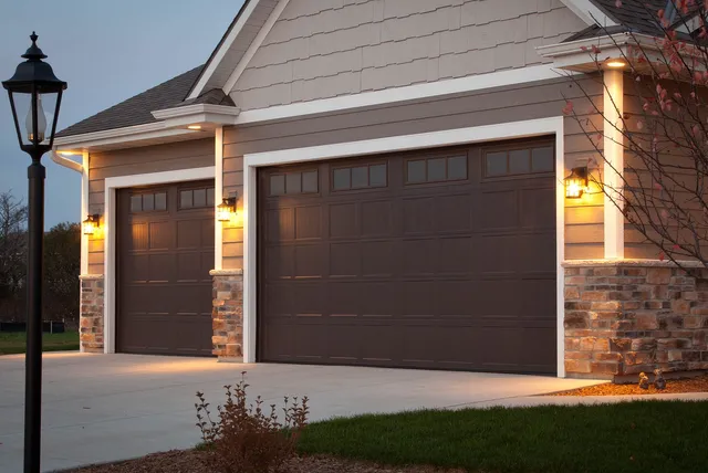 nice home with brown garage doors
