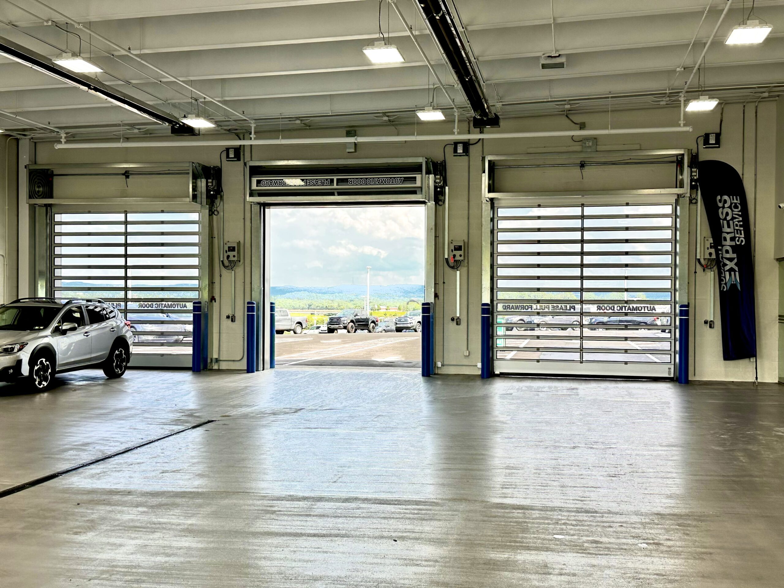 commercial garage doors at car dealership